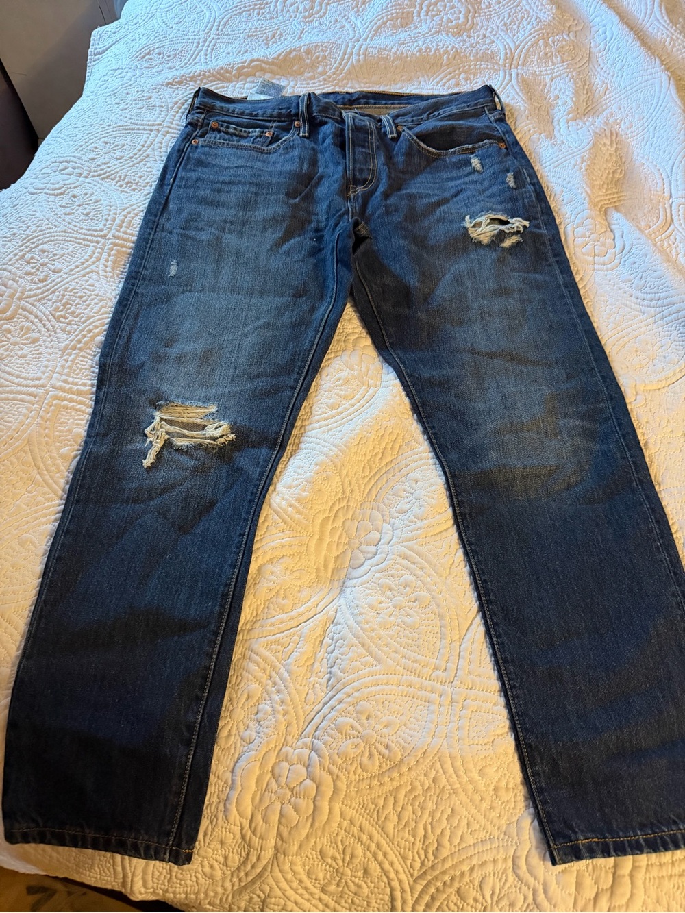 Levi's Dark Blue Distressed Ankle Jeans
